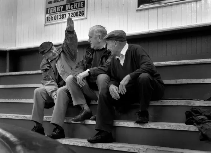 Framed Print : Three farmers chat while waiting for a sheep sale Framed Print : Three farmers chat while waiting for a sheep sale