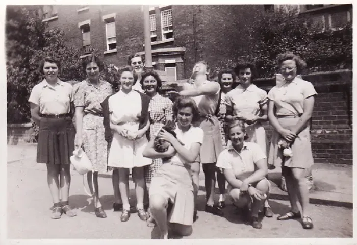Framed Print : Farming Summer - group standing in street Framed Print : Farming Summer - group standing in street