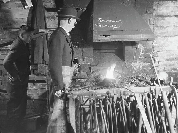 Farrier at his Forge