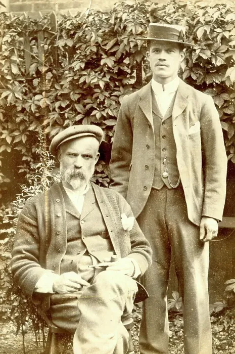 Framed Print : Father and son in a garden