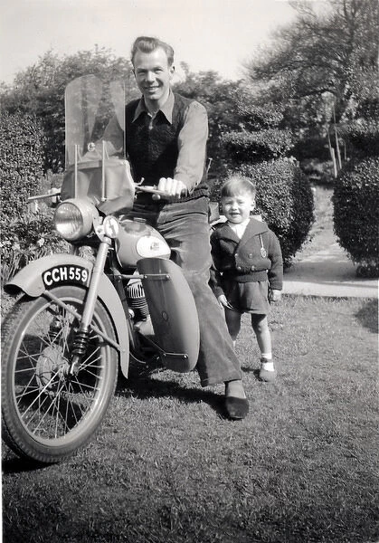 father and sonwith a 1951  /  2 BSA Bantam motorcycle