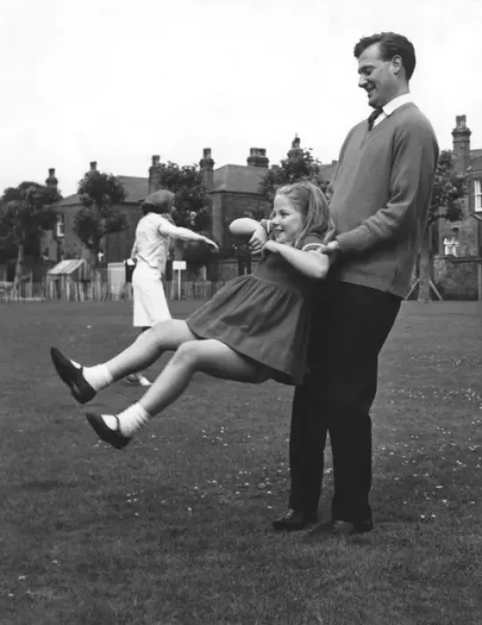 Framed Print : Father Swings Daughter Framed Print : Father Swings Daughter