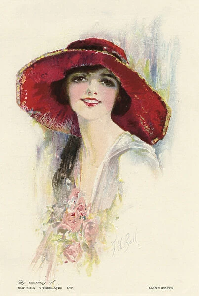 A female portrait in a summer dress and hat
