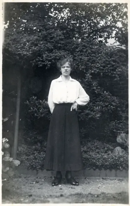 Framed Print : Female student in a suburban garden Framed Print : Female student in a suburban garden
