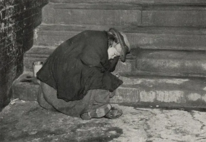 Framed Print : Female tramp asleep on steps, London Framed Print : Female tramp asleep on steps, London