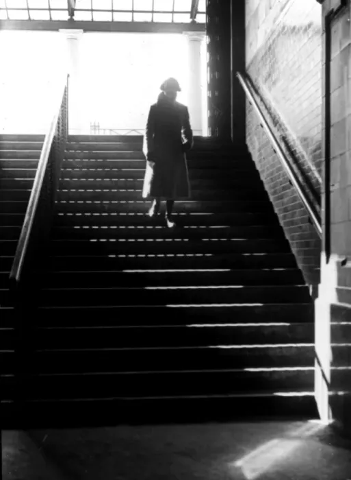 Framed Print : Figure walking down steps Framed Print : Figure walking down steps