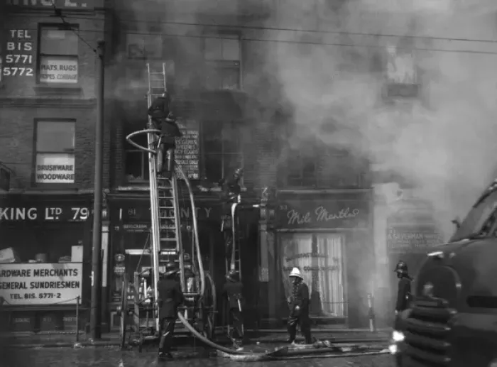 Framed Print : Firefighters in action in Commercial Road, East London Framed Print : Firefighters in action in Commercial Road, East London