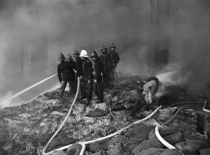 Framed Print : Firefighters in action with hosepipes, Poplar, East London Framed Print : Firefighters in action with hosepipes, Poplar, East London