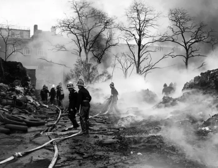 Framed Print : Firefighters in action with hosepipes, Poplar, East London Framed Print : Firefighters in action with hosepipes, Poplar, East London