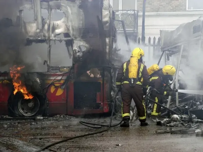 Framed Print : Firefighters attend fire at bus garage Framed Print : Firefighters attend fire at bus garage
