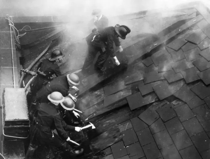 Framed Print : Firefighters cutting through a roof Framed Print : Firefighters cutting through a roof