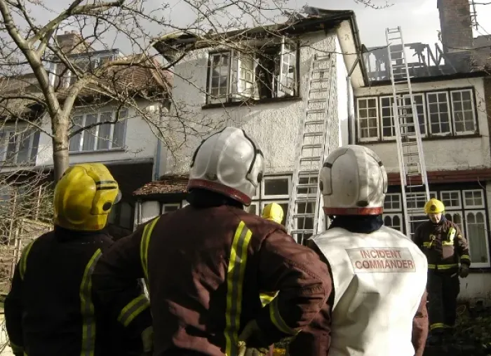 Framed Print : Firefighters dealing with a house fire Framed Print : Firefighters dealing with a house fire