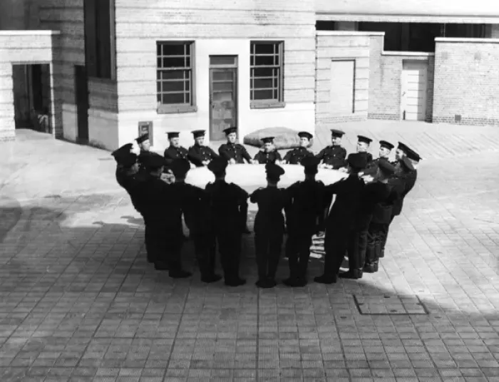 Framed Print : Firefighters with jumping sheet, Lambeth HQ, London Framed Print : Firefighters with jumping sheet, Lambeth HQ, London