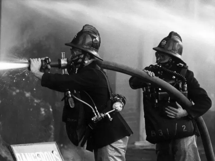 Framed Print : Two firefighters at King George V Dock, East London