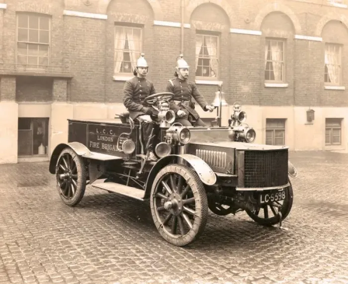 Framed Print : Firefighters in a motorised pump vehicle Framed Print : Firefighters in a motorised pump vehicle