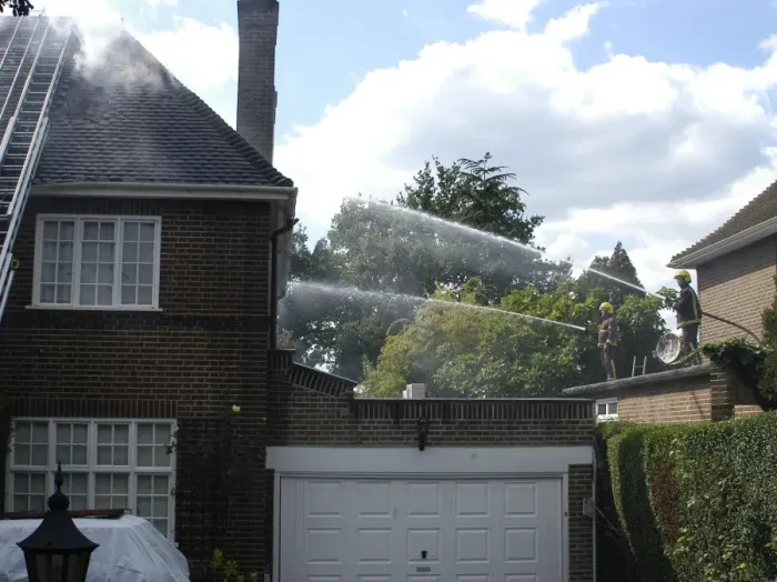 Framed Print : Firefighters respond to a house fire, North London Framed Print : Firefighters respond to a house fire, North London