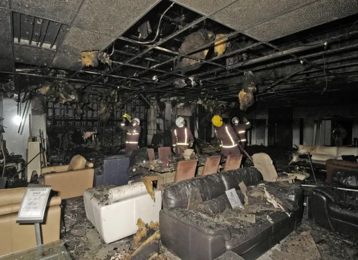 Framed Print : Firefighters at the scene of a fire in a furniture shop Framed Print : Firefighters at the scene of a fire in a furniture shop