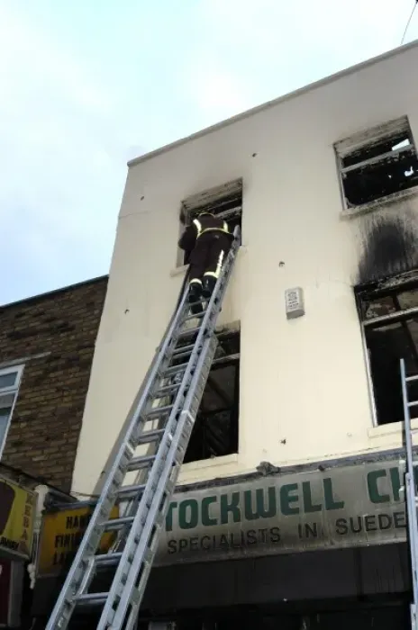 Framed Print : Firefighters at scene of fire, Stockwell Road, Brixton Framed Print : Firefighters at scene of fire, Stockwell Road, Brixton