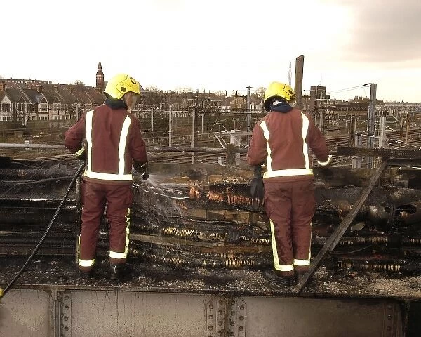 Firefighters at scene of railway fire, West London