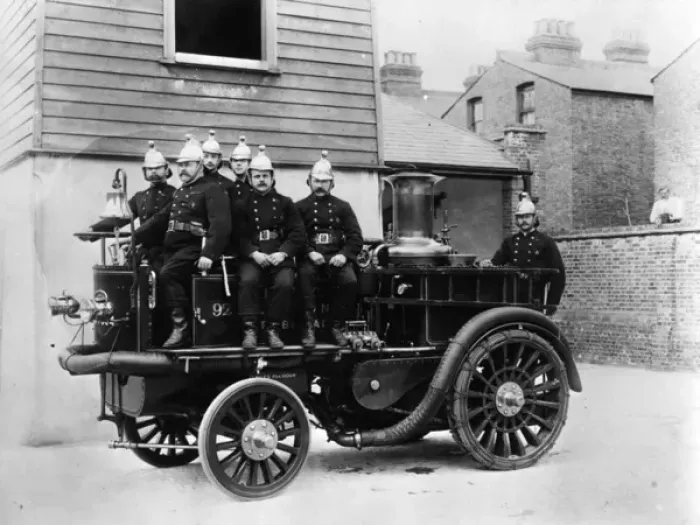 Framed Print : Firemen with early fire engine Framed Print : Firemen with early fire engine