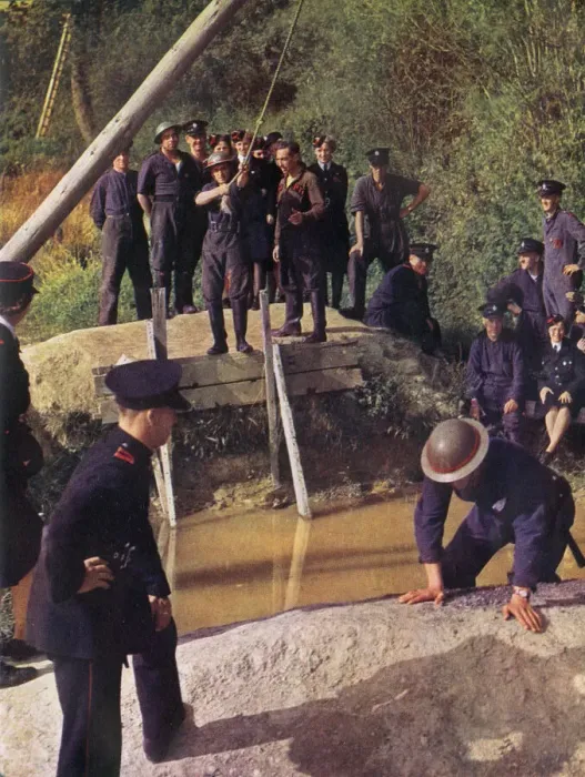 Framed Print : Firemen in training at a Water Jump Framed Print : Firemen in training at a Water Jump