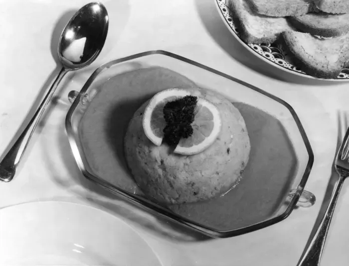 Framed Print : FISH CAKE. Fish cake in sauce, garnished with lemon Framed Print : FISH CAKE. Fish cake in sauce, garnished with lemon