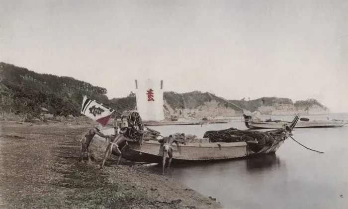 Framed Print : Fisherman launching their boat, Japan Framed Print : Fisherman launching their boat, Japan