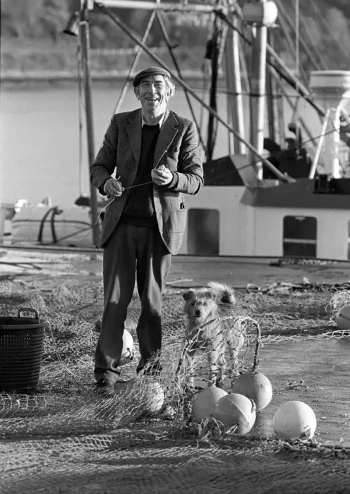Framed Print : Fisherman on quayside with his dog, Cork, Ireland Framed Print : Fisherman on quayside with his dog, Cork, Ireland