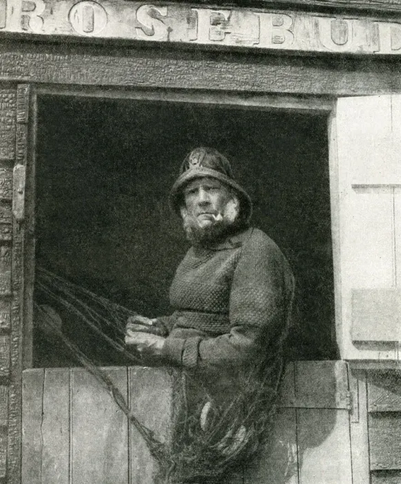 Framed Print : Fisherman repairing his nets, East Anglia, England Framed Print : Fisherman repairing his nets, East Anglia, England