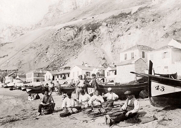 Fishermen mending nets, Catalan Bay, Gibraltar, c. 1890