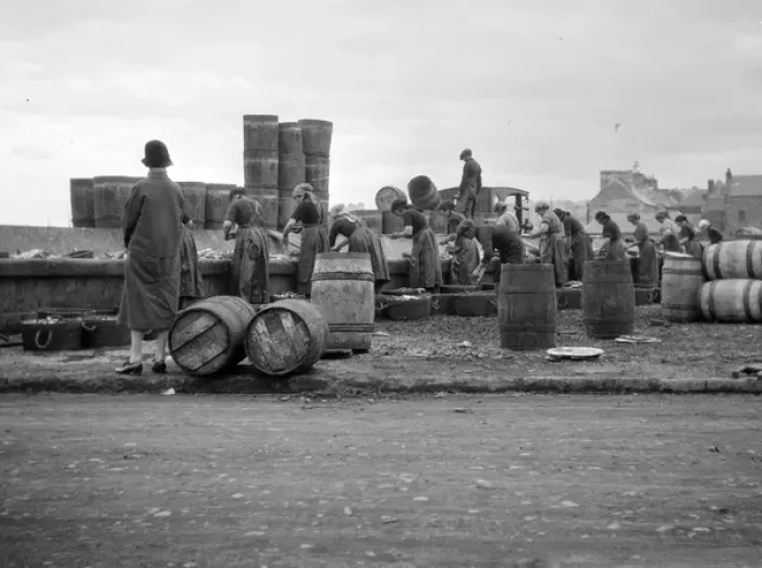 Framed Print : Fishery workers on a quayside Framed Print : Fishery workers on a quayside