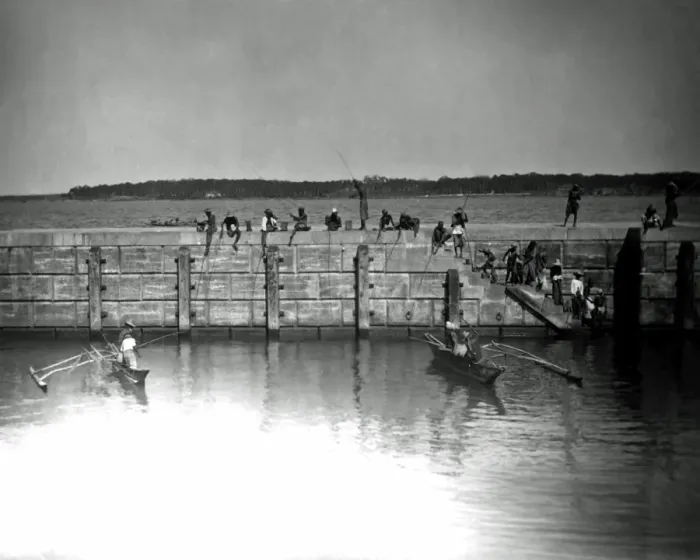 Framed Print : Fishing from a harbour wall, India Framed Print : Fishing from a harbour wall, India