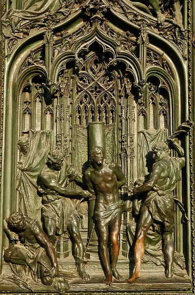 Flagellation of Christ. Door. Relief. Milan Cathedral. Italy