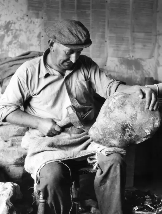 Framed Print : The Flint Knapper, at Brandon, Suffolk, England. This ancient craft is still continued Framed Print : The Flint Knapper, at Brandon, Suffolk, England. This ancient craft is still continued