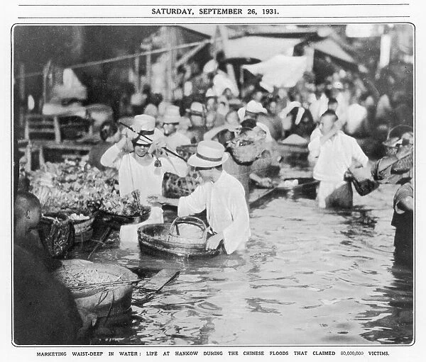 Flooded Market 1931. Marketing waist-deep in water, life at Hankow during the flood