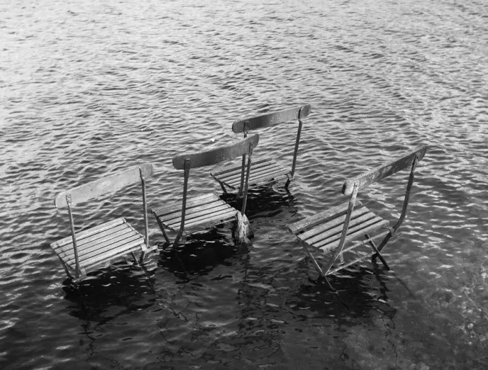 Framed Print : Flooded riverbank with chairs Framed Print : Flooded riverbank with chairs