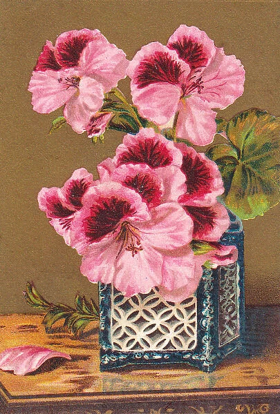 Flowers in blue and white vase on a greetings card