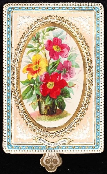 Flowers with ornate edging on a Christmas card