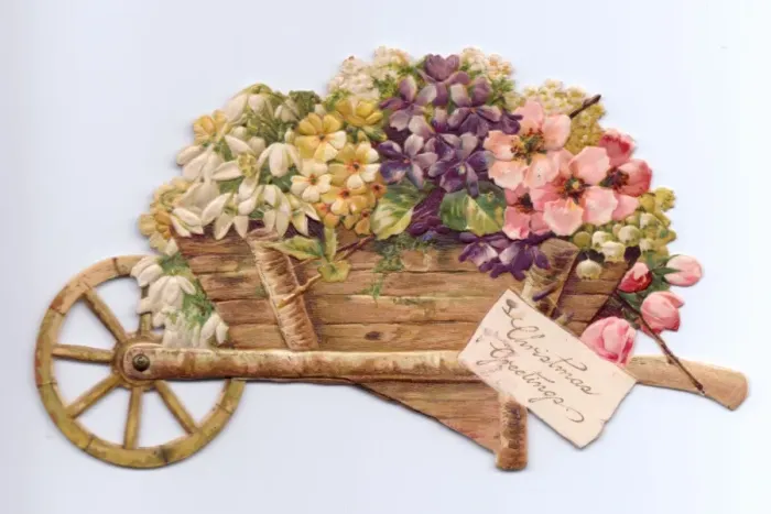 Framed Print : Flowers in a wheelbarrow on a cutout Christmas card Framed Print : Flowers in a wheelbarrow on a cutout Christmas card
