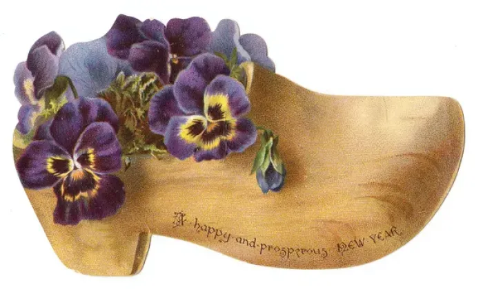 Framed Print : Flowers in a wooden clog-shaped New Year card Framed Print : Flowers in a wooden clog-shaped New Year card