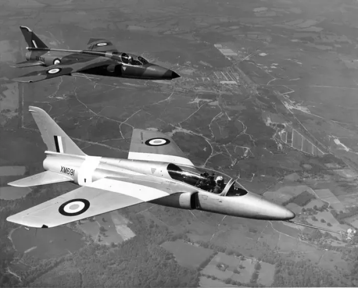 Framed Print : Folland Fo141 Gnat F1 XN326 rear with the first Fo144 Gnat Framed Print : Folland Fo141 Gnat F1 XN326 rear with the first Fo144 Gnat