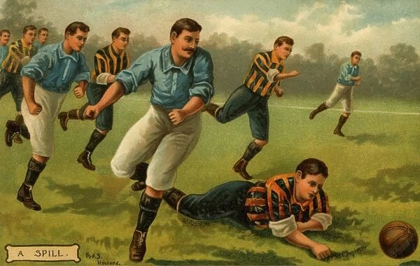 Football. ' Football: ' A spill'. ' Date: c.1904