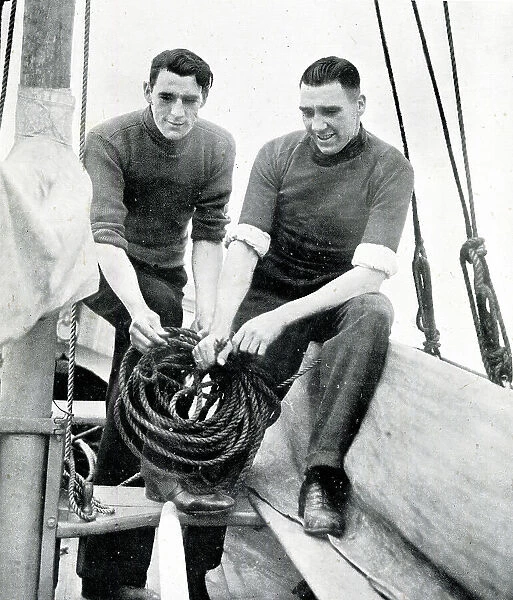 Football brothers, Frank and Fred Swift, on their boat