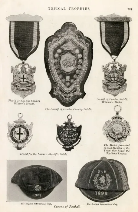 Framed Print : Football trophies, medals and caps Framed Print : Football trophies, medals and caps