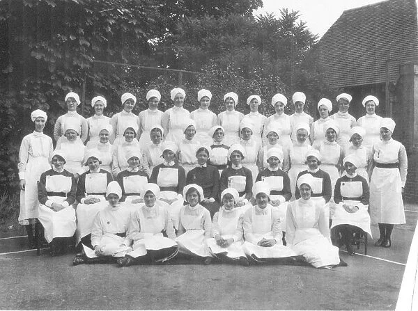 Formal group of matron, nurses and sister outdoors