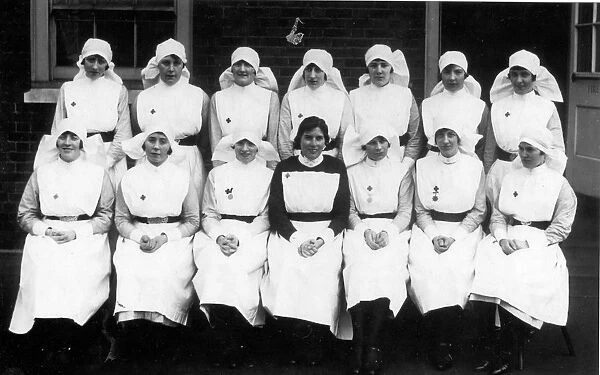 Formal group of nurses and sister outdoors