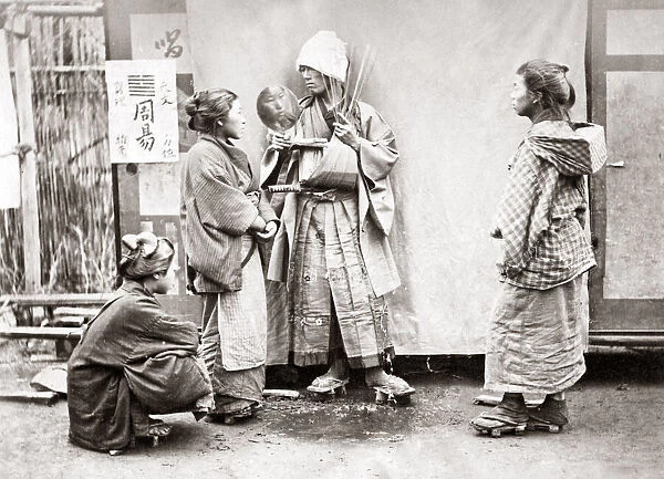 Fortune tellers, Japan, circa 1870s. Date: circa 1870s