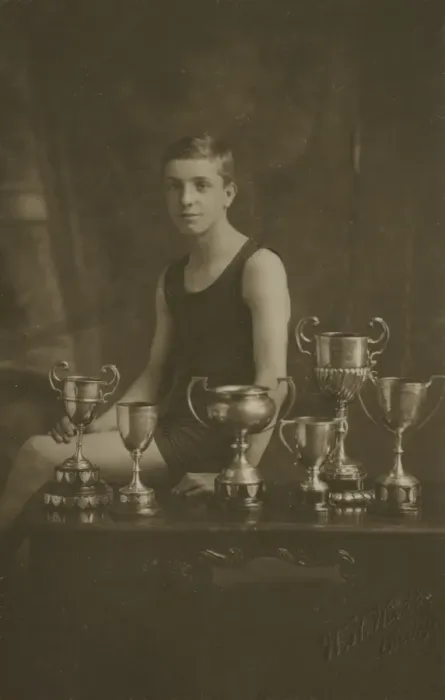 Framed Print : Fourteen year old swimming champion with trophies Framed Print : Fourteen year old swimming champion with trophies