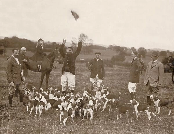 Foxhunting group with hounds
