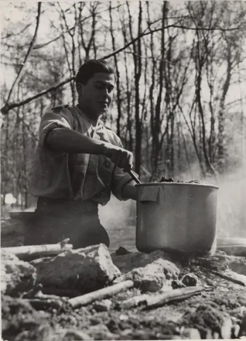 Framed Print : French boy scout cooking at camp Framed Print : French boy scout cooking at camp